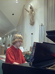 [Tom Fahey plays piano.]