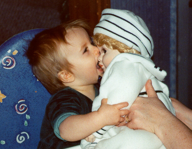 Anna's first birthday - she gets a doll - December 2000